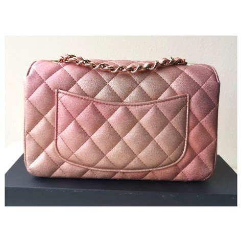 chanel pink iridescent bag.